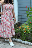 One of my favorite dresses from loft. Fits very well and love how I look in it. Fits true to size but I ordered a size down as the chest area is smocked and was thus stretchable. Unlike some reviews I did not have an issue with the tightness of the sleeves. - Adrita B.