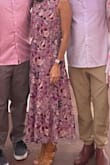 I wore this to a summer, 80th birthday party. The material was light, and flowy with movement.  The color was just like the picture. The waist is elastic so it's forgiving in size. It would work with a belt, tennis shoes so very versatile. I just washed and dried it and it remains beautiful. The only drawback is the arm pit holes were a tiny larger for me so my bra was slightly visible, but not a dealbreaker for me. My first time buying on this website, I'll definitely come back to it. - Roselle T.