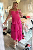 The dress is gorgeous on. It fits true to size and is so cute. Great quality material too! - Lily A.