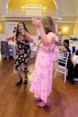 Wore this to my friend's wedding in May. It was lightweight but well made and I felt pretty in it. I couldn't wear a normal bra because of the open back. Paired it with bright pink heels. Hope to wear it again. - Megan W.