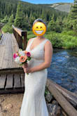 Absolutely LOVED this dress! I wore it for my mountain elopement. It fit like a glove and the only alteration I needed was to be shortened. The reason for 4 stars is because of how easily it snagged and the beads fell off. Just trying it on I lost a bunch of beads. It's definitely not meant for a hiking wedding but I loved the way it looked. - Katie R.