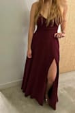I ordered a small one and was perfect. Couldn't wear a bra but it didn't matter because the lace in the back helps adjust the décolletage. It was very comfortable and fun to dance in. Received many compliments. - Ester N.