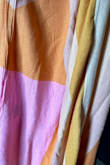 It's lovely. The fabric is fresh and light, the colors are different and warm. I love . - Lili Q.