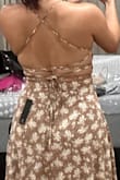 This is such a cute little summer dress. Great length the back is cute (although I do need to ask help to put it on lol). I assumed it was going to be of lighter thinner material but it's on the heavier side but it's not a deal breaker for me. - Jess M.