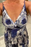 The dress was very pretty, loved the colors, and it fit very well. No bra needed. However.... the placement of the flowers made for a very... ummm... interesting effect.  LOL  I'm sure if I exchanged it for another one it would be fine, but I was in a time crunch. - Ashley A.