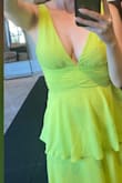 Love this dress! Got it for a party in Miami, and absolutely love it. It was slightly tight, and I had to enlist a friend to zip it up for me, but it was still comfortable after it was zipped up. It kept my boobs in place without a bra and is very comfortable. I loved the bright neon green for a Miami Beach party. - Melanie Y.