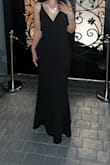 I ordered this dress for a wedding in my usual size but had to return and order a size up. Overall I was happy with the look and fit of the dress and got lots of compliments throughout the night! The back of the dress is very sexy and is what caught my eye. The only issue I had was that there was a strange extra piece of fabric bulging out from the right hip that I had to cover when taking pictures. Almost looks like someone tried to alter it on the sides and did a poor job. - Jessica G.