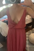I'm an XS and 5'4 and it's way too loose on the top, like when I bend over my boobs pop out. I'll have to take it to my seamstress to have the straps shortened. Wish they had adjustable straps. I'm probably not ordering dresses from Lulus in the future. - Donna G.