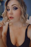 Really cute necklace, especially great for low cut blouses or dresses. Perfect placement of bottom necklace pendant right between the girls! ;-) It is a darker rose gold color though, almost copper like. - Jessica H.