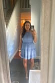This dress was perfect for the wedding I was attending! Super lightweight material. There's a bit of stretch in the middle at the waist which was nice. Overall I loved the dress so flattering and perfect for summer! - Val H.