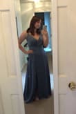 The dress was a little long for my height but was a good length with heels. The color compliments my skin tone very well and the straps adjust. The fabric is flattering and doesn't show my body rolls. A great dress for attending a wedding! - Grace M.