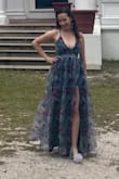 This dress was so flowy and pretty! I loved wearing it. The pastel colors are lovely! - Reyna H.
