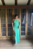 I purchased this dress for a wedding and I fell in love with it! The color was absolutely stunning and it fit like a glove. The material is overall pretty light, so it was great for summertime. My only complaint is that the material got damaged and started to fray in my right hip area (so I'm thinking this was from my purse and also dancing?) but still, loved the dress and can't wait to find somewhere else to wear it in the future = - Annika D.