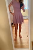 Love it! Very flowy and comfortable. The slit is somewhat unique and a little strange but I loved it regardless and the color is my favorite part! - Maci P.