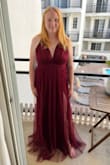 This is a pretty dress, but definitely runs a little small so order a size up. I was not able to zip it. Would be perfect for something like prom. - Laura K.