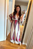 I loved this dress!  It was roomy, flowy, and comfortable.  I had to use fashion tape to ensure the V-neck didn't reveal too much of my chest, but it worked out perfectly.  An excellent fit for a night out on the town! - Alexandra D.
