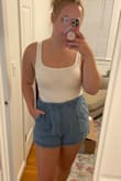 I wanted to love this so bad!! The material is soft and comfortable, and the cut is really flattering. But it's completely see-through! I'm wearing a nude stick-on bra in these pics and it's completely obvious. I'm not usually one to care if you can see a bra a little bit, but this is too much. I'd consider this a sheer fabric. - Olivia C.