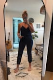 I bought this jumpsuit for vacation and wore it once. It was really cute and fit perfectly but when I got home and washed it (and air-dried it!) it shrunk so much that I can't even wear it again. What a waste of money. Don't buy this if you plan on wearing it more than once like a normal person. Photo is after it shrunk. The pants part is skin tight. - Robin B.