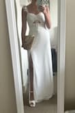 Bought this dress for my bridal shower and I love it! Not see-through at all and really flattering on your waist/stomach. The top for me was a little big, probably could have done an XS but the S would work too. - Nicole A.
