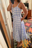 Its a great midi dress for summer. The fabric is a little thicker and good quality. Very comfortable, flattering and girly. - Ada T.