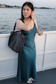 I absolutely love the color of this dress. I bought it for my anniversary and funnily enough, it pretty much is the color I want my bridesmaids to wear for my wedding. 

I took off one star because i think the dress wasn't engineered correctly when you actually wear it for the day vs just trying it on in front of the mirror. If you tighten the straps too much (I didn't want the V neck to be too low), it causes the fabric to bunch up beneath your armpits. It could also be hard to sit at times because the dress has two layers; when you sit, you pull down on the inner layer which constricts your movement. 

Overall I think this dress looks very nice, but the straps and the way the dress sits on your hips in the back could have been a bit better. I did have to get it altered like 2-3 inches. - Nancy C.