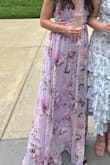 Loved this dress but where the ruching is under the bust it was tight and there was no give. I ordered a small. Ended up having seen in clasps to thread with a ribbon to tie it in the back because the zipper would not go up. Did not have to hem and am 5'10 in the heels I wore. I got a ton of compliments. Maybe would have gotten a medium and had it altered. - Loren R.