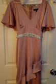 This dress is amazing. Fits beautifully and so comfortable. I added an crystal belt and it still looks amazing. - Nicole B.