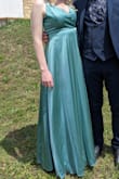 Stunning dress! I am so happy that I bought it. Great material and very sleek. It fits true to size. If you're thinking about it, get it - Hayley A.