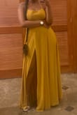 This dress was beautiful but like everyone else the slit goes up way to high and the dress is super long. I found myself stepping on it even with heels on. Overall loved the dress, just needs some minor alterations to be better. - Jamira R.