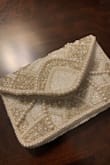 Its such a beautiful bag. Elegant and unique for a evening bag. I received so many compliments, definitely a special occasion must have. - Sonia