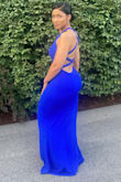 This dress is beautiful, it fits perfectly, the open/detailed back is absolutely gorgeous. I got so many compliments on it. - Marta C.