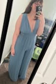 This jumpsuit feels high-quality. I am 5'8 and this is the first item of clothing I've ever purchased that is too long for me, I'll have to wear heels with it! I do have a smaller than average chest so the top is a bit large on me, but that's a me problem. I think the jumpsuit is proportioned well! - Kay M.