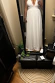 This was my second option for my elopement dress. It fit nicely only issue was the breast area wasn't the best. Around the arms were tight but the breast area was very loose but gorgeous I didn't end up wearing it for my elopement but will for another special occasion. - Julie H.