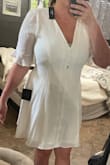 I'm super bummed I ordered this for a beach photo shoot with my 6 month old and it fit perfectly everywhere except for my boobs. I'm still breastfeeding and you could tell it was pulling at the buttons if I had time I would've ordered the same dress in a larger size! - Emily M.