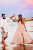 This dress was perfect for our family pictures on the beach. Will definitely re-wear to a wedding, as it also makes for the perfect wedding guest dress. I had to have a few inches hemmed since the pictures were taken barefoot. Good quality & material. Fits tighter in the bust, I am a true 36B & it was very fitted over the bust area. Very elegant and classy. I highly recommend this dress! - Sarah V.