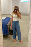 This shirt is so cute! I've worn it multiple times and it never disappoints. It goes so well with jeans, skirts, and shorts. It is the perfect versatile white top for summer. I've washed it a few times now and the material has stayed intact and you can tell the item was made well. - Francesca G.