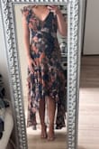 Really loved this dress. It looks beautiful on and fits perfectly. I got this for a summer wedding in the Cape and I cannot wait to wear it. It'll work perfectly for a hot summer wedding. Only thing I will note is that it is a little tight in the chest if you have a bigger chest but nothing too concerning at all! - Emma S.