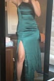 I bought this for a wedding and I love the simplicity yet elegancy of this dress!! I'm usually a medium but ordered a small and it fits nicely (minus the little scrunch it does in the back area above my bum). I will probably have to get it altered because it is a bit too long for my liking. The material seems like it would get wrinkled easily so a little worried about that. But overall, it's a cute dress!!! - Christal A.
