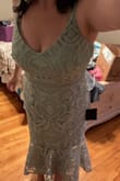 Beautiful dress and I love the color. The fit is not for my body type and I didn't really like my proportions in it. Not the dress's fault. The zipper was a pain just FYI. Reviews made me order a size larger than normal and I didn't need to. Including a photo because I know the photos always help me out. I'll be getting a different dress. - Alison G.