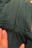 Broken zipper. The dress will hardly zip as the stitching is off. Not wearable. And this was a replacement dress for one I ordered but Lulus lost. Very disappointing. The color is deeper in person. Oh, and the dress is oddly now $10 more than when I ordered last week. - Meagan F.
