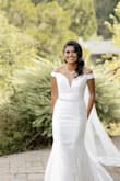 This dress fit like a glove on me. Had to take the sleeves in just a little, and adding a belt was a good decision. The material can be a little stiff, and it did crease over the day. - Vikashini S.