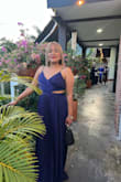 It's a beautiful dress that fits a little bit small. - Carmen S.