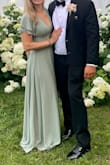 This dress fit like a glove, I received SO many compliments on the fit of the dress, the color, everything. It was super hot and this dress remained cool. I am literally in love with this dress so much I bought both colors. 
Would definitely recommend. - Ariana P.