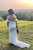 I wore this dress for my wedding and it was perfect! The quality and fit are amazing- snug in the right places and it didn't fall down in the chest, the train was long and dreamy, but easy to manage. The material under the outside layer was stretchy and comfortable. Could not love this dress more- highly recommend it. - Carly P.