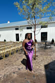 So, I wore this dress to my cousin's wedding. The color was so perfect, bold, and bright. I thought it would've been really long length-wise, but it was the perfect length and I'm 5'0 flat! I was pleasantly surprised. I love a one-shoulder dress because I can still wear a bra, but I chose to wear boob tape and it worked amazingly well. 

The only flaw was the bunching in the hem on the sides of the dress. I wish it didn't do that, but overall, I can definitely see myself wearing it again! - Antoinette T.