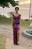 I chose this dress to attend a wedding because it was the perfect amount of sparkle and glam without being too loud or overpowering, as I'm not a relative of the bride or groom. The dress is so much more beautiful in person and the pink sequins pop really nicely. The neckline and the slit are also just the right amount of sexy, without being inappropriate. I got it on sale and it was such a steal of a deal! - Sherise B.