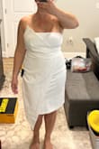 Obviously looks better on the stick figure model. I ordered a Large and it's still a bit snug. I usually wear a medium but this ran pretty small. - Tiffany O.