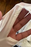The back closure was ripped, probably because the stitching was horrible. The stitching along the back corset closure was not sewn down all the way. Looks like the machine was broken. - Myleen R.