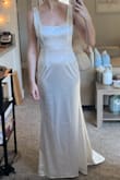 I think I'm just not a fan of this fabric. It really highlighted my stomach, which was extremely unflattering. I was hoping to wear this for my wedding reception, but I'd never feel comfortable wearing this if I was bloated/just ate lol. Also, the straps felt wrong and loose. They wouldn't really stay up. Also, the way the fabric hugs the butt is weird. It really highlights each individual butt cheek. - Haley H.