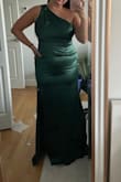 This dress was a bit too long on me, I am 5'6" and would have had to get it hemmed about 3 inches for it to not drag on the ground. Overall the dress was really pretty and fit well but not super comfy, I loved the color but ended up choosing a different dress - COURTNEY C.